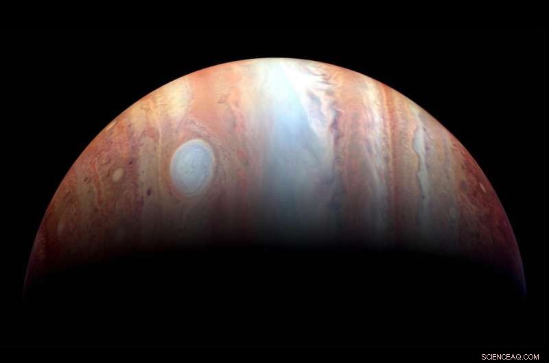 Young Jupiter Impacted by a Massive Newborn Planet: Revealing Early Solar System Dynamics