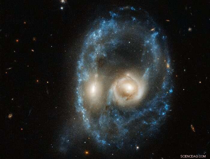 Hubble Reveals Ghostly Face Formed by Colliding Galaxies