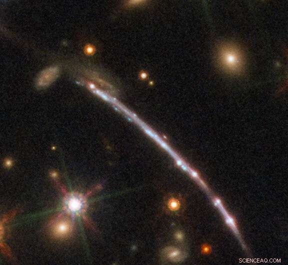 Hubble Sees Dozens of Sunburst Arc Images, Illuminating Cosmic Lens