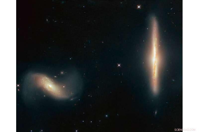 Hubble Reveals Intimate Interaction Between Galaxies NGC 6285 & NGC 6286