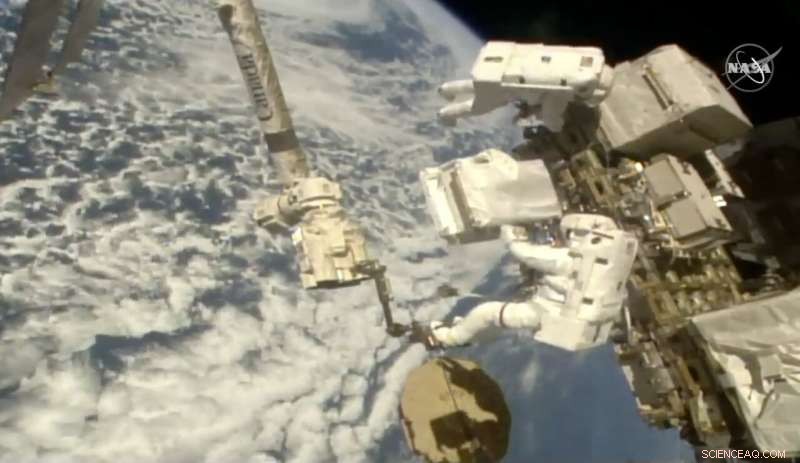 ISS Astronauts Install New Pumps in Alpha Magnetic Spectrometer