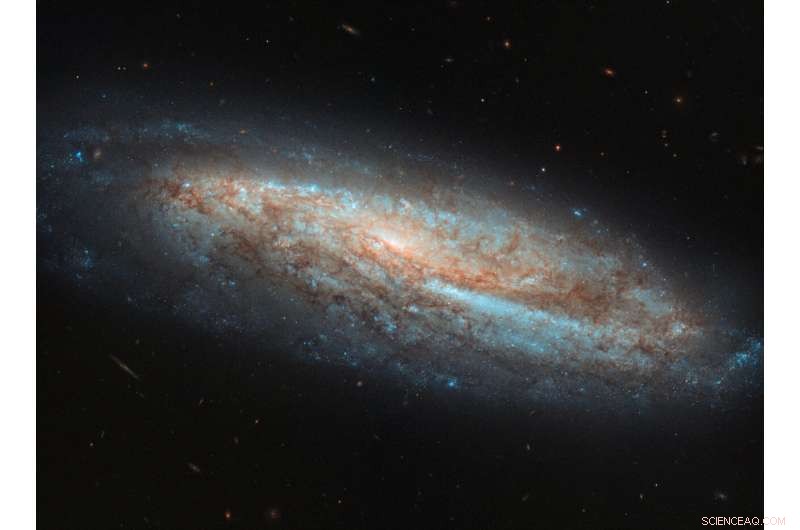 Hubble Reveals Barred Spiral NGC 7541 and Emerging Stars