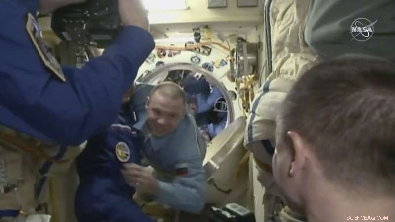 Space Crew Welcomes New Members with Hugs Amid Pandemic