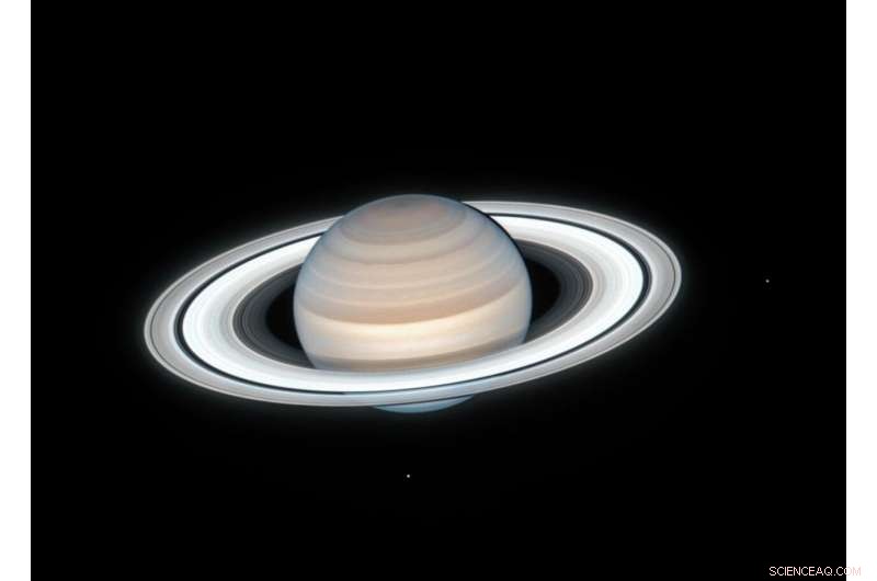 Hubble Captures Saturn’s Summer: Stunning View of Mimas and Enceladus