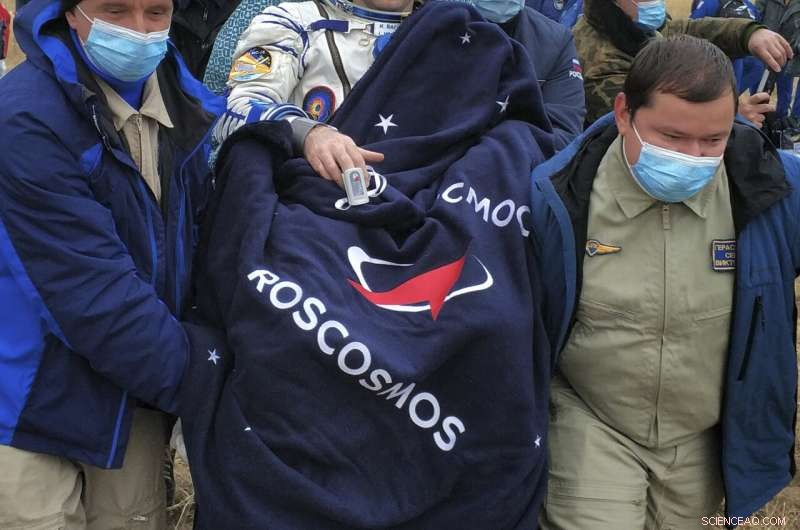 Three astronauts safely return to Earth after space station mission