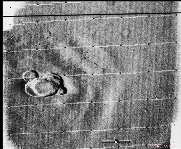 Mars Crater Erupts: Images Capture Lava Breaching Wall and Filling the Basin