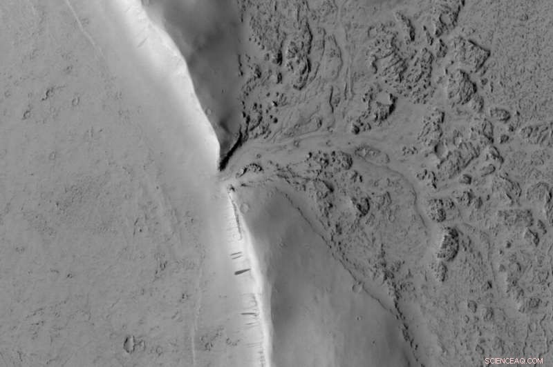 Mars Crater Erupts: Images Capture Lava Breaching Wall and Filling the Basin