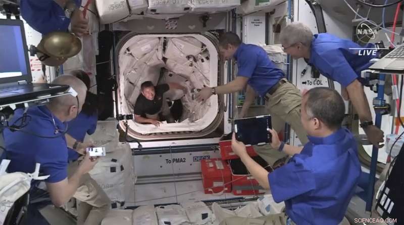 SpaceX Dragon Docking Brings Record-Breaking Crowd to the ISS