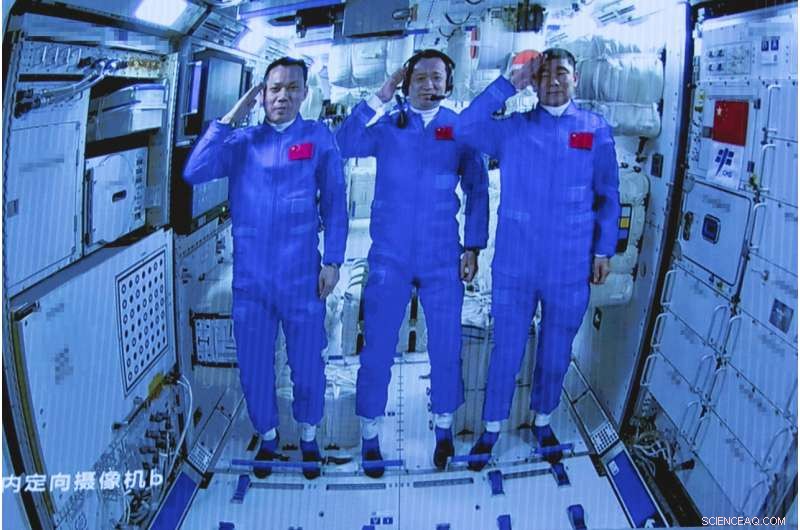 Crew Begins Life on China s New Space Station