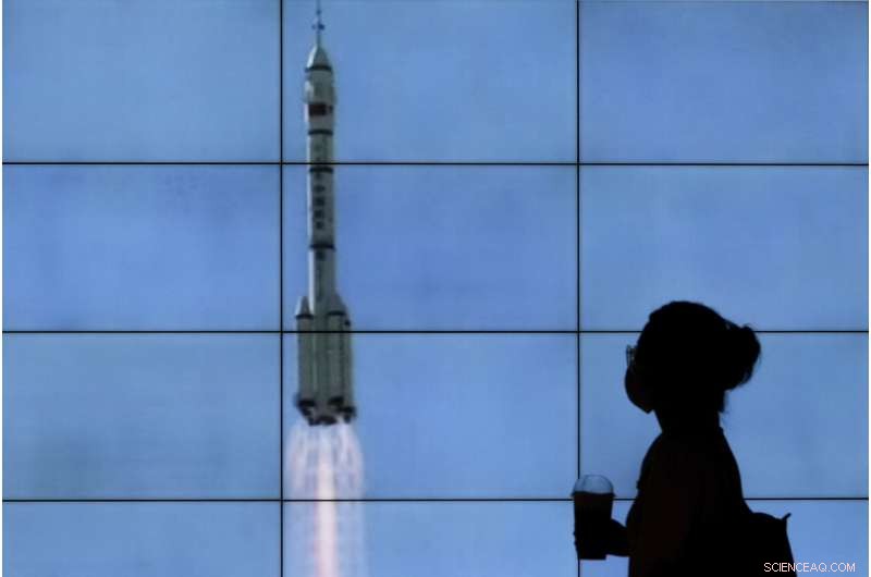 Crew Begins Life on China s New Space Station