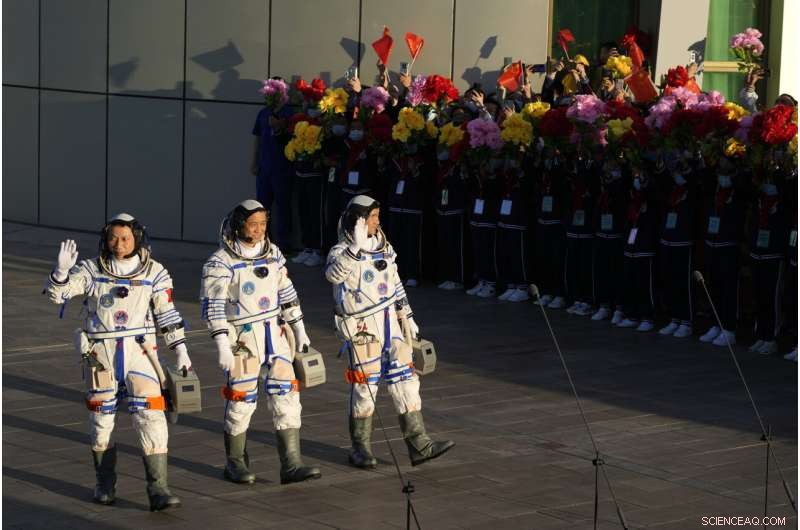 Crew Begins Life on China s New Space Station
