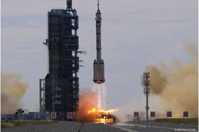 Crew Begins Life on China s New Space Station