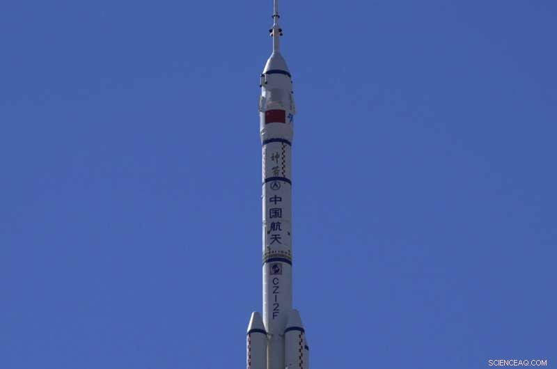 Crew Begins Life on China s New Space Station