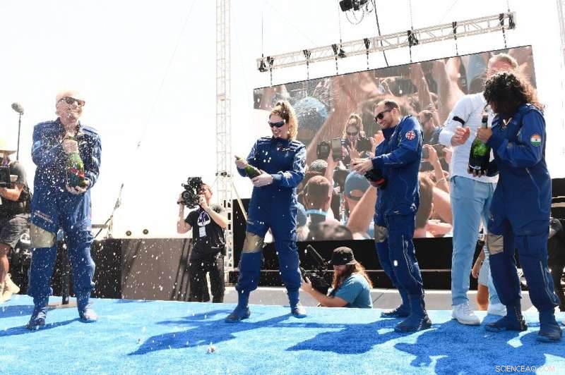 Celebration After Branson s First Spaceflight: Champagne Toast and Celebrity Applause
