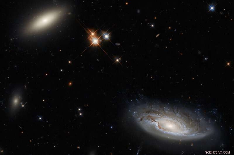 Hubble Captures Remarkable Dual Galaxies: 2MASX J03193743+4137580 & UGC 2665
