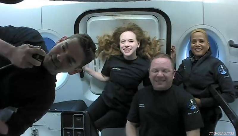 Inside SpaceX s Dragon Capsule: Life on the First Space Tourism Flight