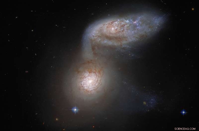 Hubble Reveals Intense Interaction Between Two Distant Galaxies