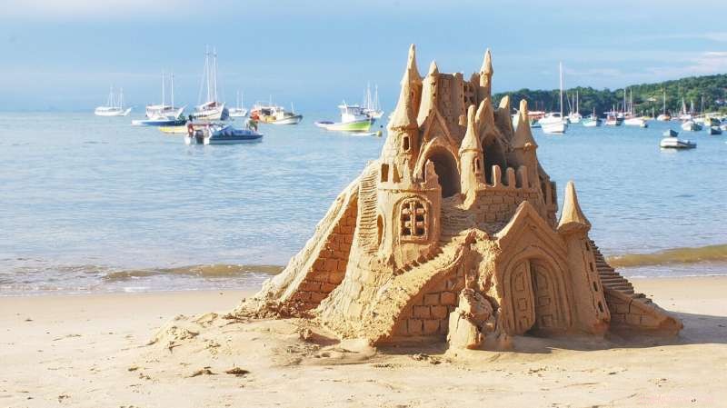 Sandcastle Engineering: How Water, Air, and Sand Build Strong Structures