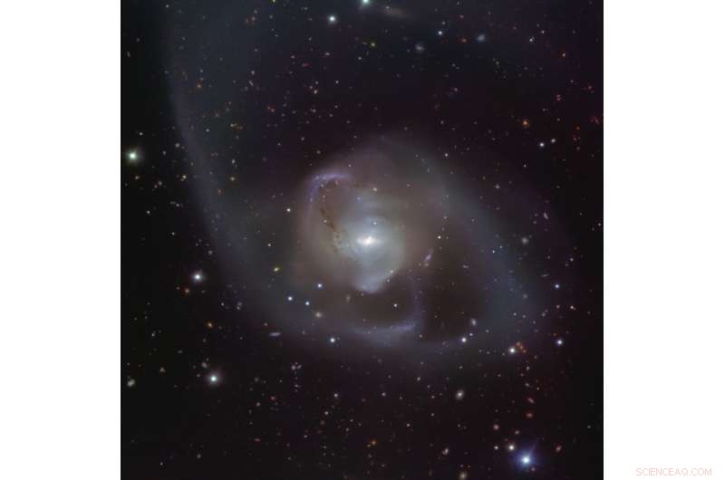 ESO Telescope Captures Stunning Cosmic Dance in Merging Galaxy NGC 7727