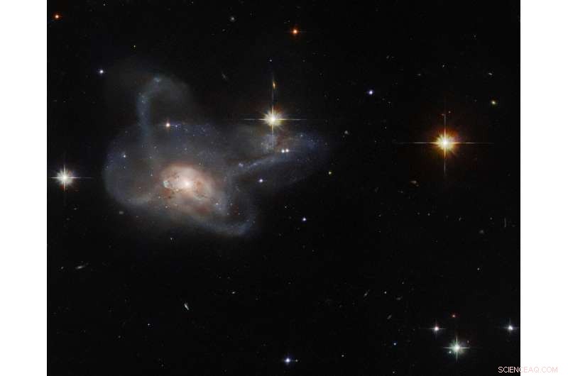 Hubble Captures Stunning Merger of Multi-Arm Galaxy CGCG 396-2