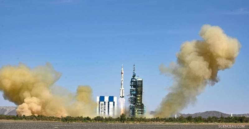Three Chinese Astronauts Reach New Space Station on Long March-2F Mission