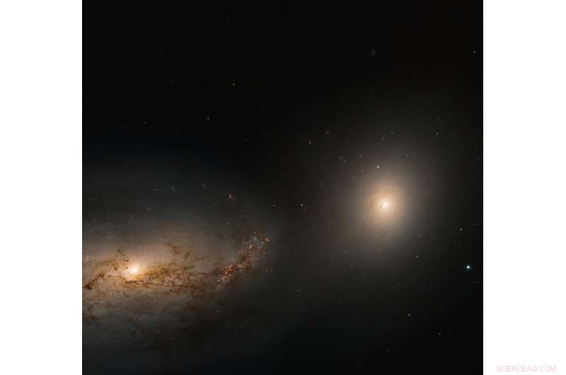 Hubble Reveals Dynamic Interaction Between Spiral NGC 3227 and Elliptical NGC 3226