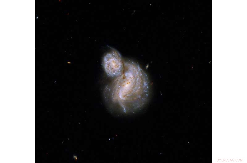 Hubble Reveals Mysterious Interacting Pair of Spiral Galaxies
