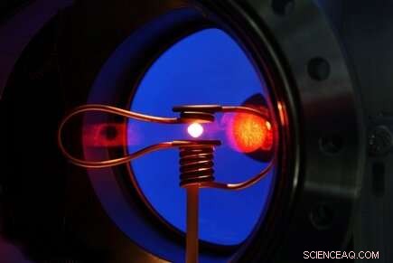 Scientists Study Glowing Metallic Glass Droplets aboard the ISS