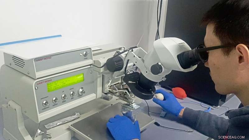 Light-Induced Electron Steering in Graphene Reveals Valley-Selective Hall Effect