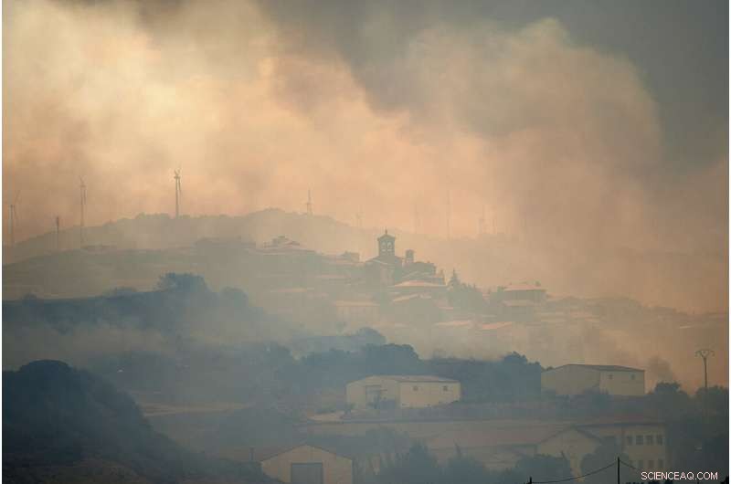 Cooler Temperatures Contain Spain s Largest Wildfire; Rain Aids Germany