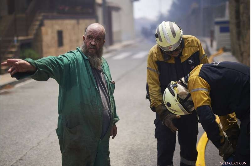 Cooler Temperatures Contain Spain s Largest Wildfire; Rain Aids Germany