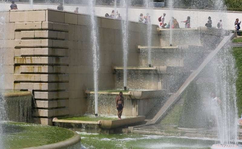 Europe Endures Record-Breaking June Heatwave, Parisians Seek Relief in City Fountains