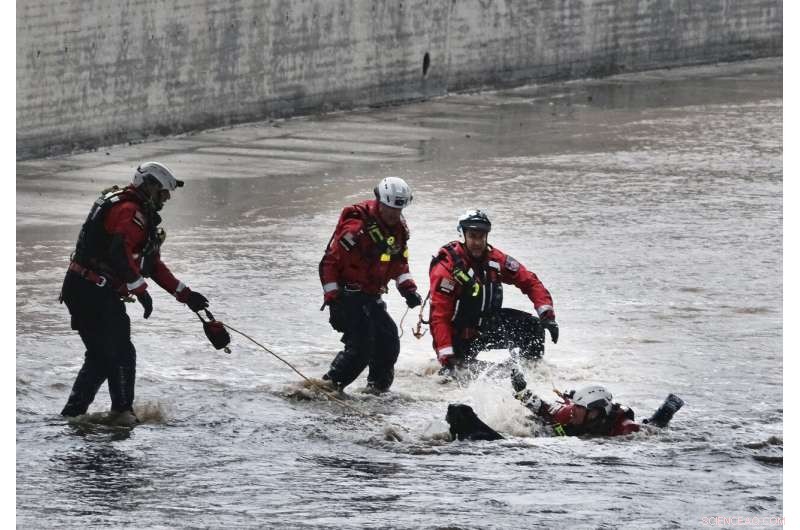 Two People and a Dog Rescued from Flooding River During California Storm