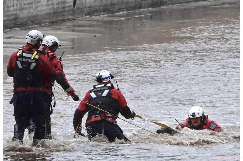 Two People and a Dog Rescued from Flooding River During California Storm