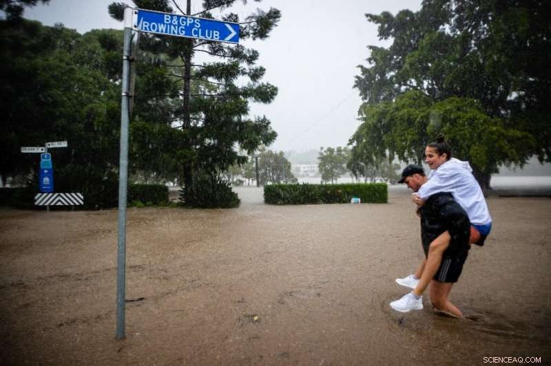 Australia Flood Crisis: Rooftop Evacuations and Rescue Operations
