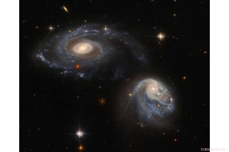 Hubble Reveals Two Interacting Galaxies in the Arp-Madore 608-333 Pair