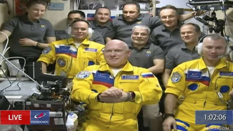 Three Russian Cosmonauts Arrive at the ISS in Yellow-Blue Suits
