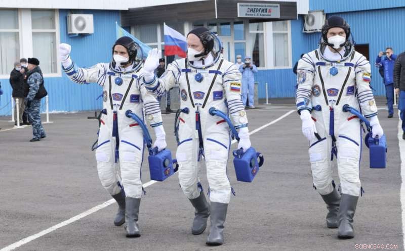 Three Russian Cosmonauts Arrive at the ISS in Yellow-Blue Suits