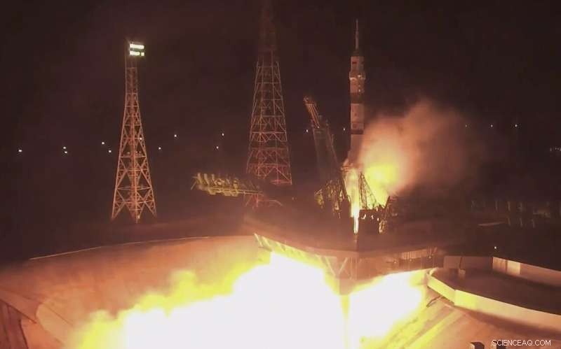 Three Russian Cosmonauts Arrive at the ISS in Yellow-Blue Suits