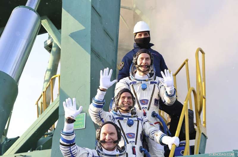 Three Russian Cosmonauts Arrive at the ISS in Yellow-Blue Suits