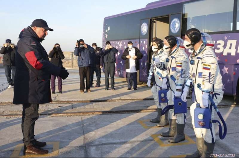 Three Russian Cosmonauts Arrive at the ISS in Yellow-Blue Suits