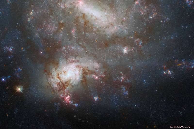 Hubble Captures Close Encounter of Twin Galaxies NGC 4496A & NGC 4496B