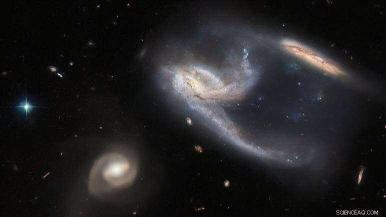 Hubble Discovers Starship-Shaped Galactic Duo in NGC 7764A