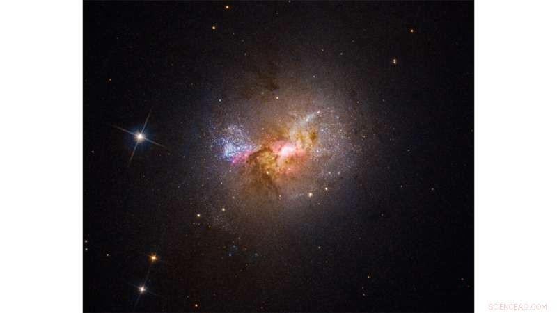 Hubble Reveals Black Hole Driving Star Formation in Dwarf Galaxy