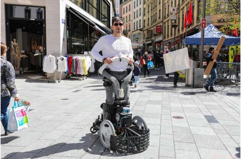 Innovative Robotic Wheelchair for Safe Crowd Navigation