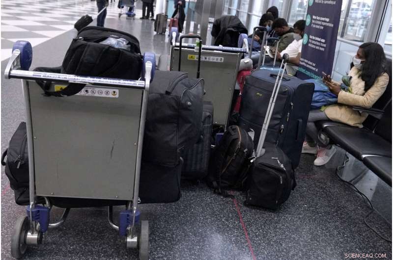 Omicron Variant Sparks Major Flight Cancellations, Disrupting Holiday Travel as 2021 Ends