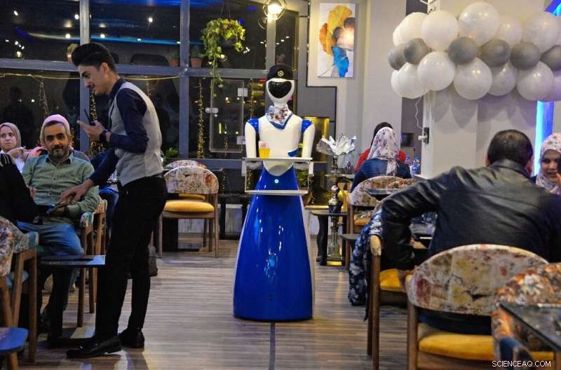 Robot Waiters Bring High-Tech Hospitality to Mosul s White Fox Restaurant