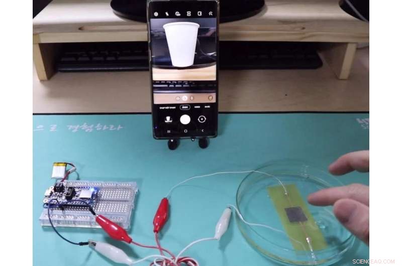 Waterproof Pressure Sensor Enables Underwater Control of Wearable Electronics