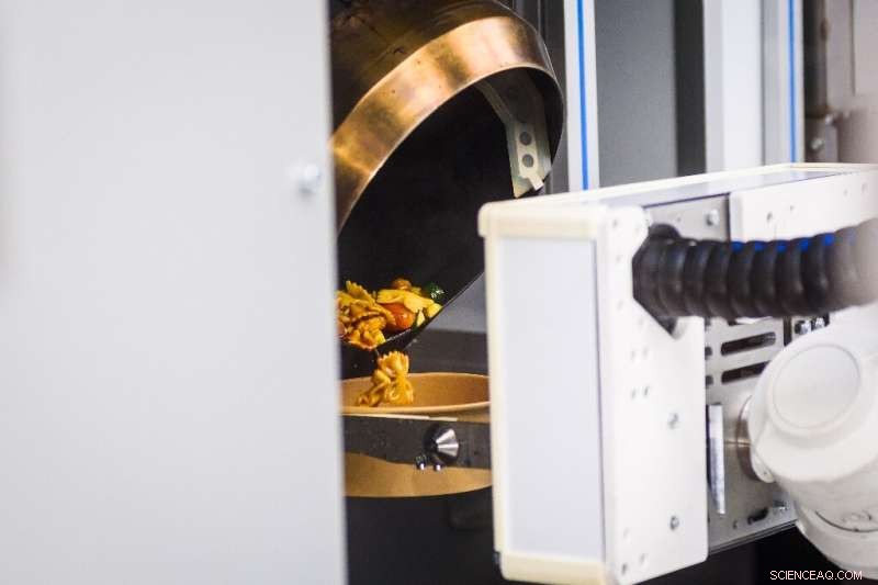 Riga s Roboeatz Cafe: Robotic Arm Prepares Fresh Meals in 5 Minutes