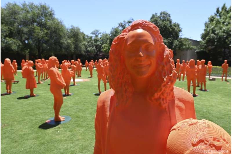 Smithsonian Celebrates Women s History Month with 120 Neon Orange Scientist Statues